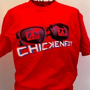 Men’s red “Chickenfoot” band t shirt size M loose fit. Plain back. Never worn.